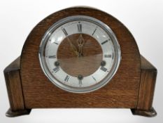A Smiths Art Deco oak cased mantel clock,