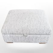 A Parker Knoll storage footstool in grey fabric,