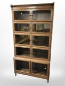 A Minty Ltd, Library Specialists, Oxford, glazed oak five height stacking bookcase,