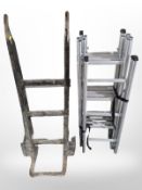An antique porter's sack barrow and an aluminium extension ladder