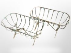 A pair of wrought-metal garden planters, width 60cm.