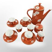 A fifteen piece Noritake tea service decorated with chrysanthemums on red ground