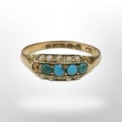 A 15ct yellow gold ring set with turquoise stones, size O.