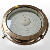 A brass ship's compass, diameter 29cm.