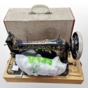 A Veritas hand sewing machine, in box.