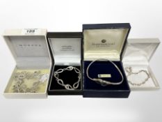 A group of silver jewellery comprising an amethyst bracelet, a torque bangle, twist bracelet,
