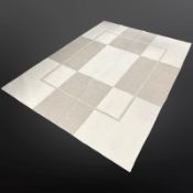 A contemporary wool three-tone carpet, 175cm x 239cm.