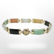 An oriental 14ct gold-mounted hardstone bracelet, length 18.5cm CONDITION REPORT: 9.