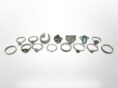 15 silver and other dress rings.