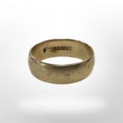 A 9ct yellow gold band ring, size R. CONDITION REPORT: 5.3g.