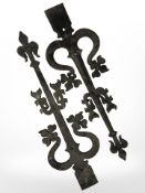A pair of decorative cast-iron brackets, length 63cm.