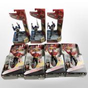 Seven Bandai Power Rangers figurines, boxed.