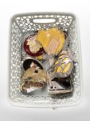 A collection of car and motorcycle badges including The AA, BSA, Honda,