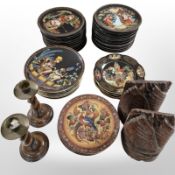 A quantity of Egyptian-themed porcelain collector's plates, pair of oak barley-twist candlesticks,