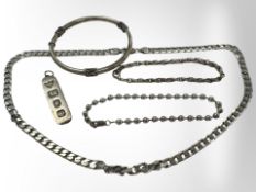 A silver curb link necklace, an ingot pendant, two bracelets and a bangle.