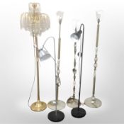 Six standard lamps including three brass and onyx examples.