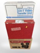 A Eumig projector, Sankyo Sound-700 projector, and IQ 3-in-1 video transfer unit, all boxed.