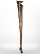 Four walking sticks one with brass eagle head pommel
