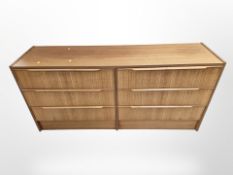 A Danish Steens teak and MDF six drawer low chest,