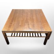 A Danish teak Haslev drop leaf square coffee table with under shelf,