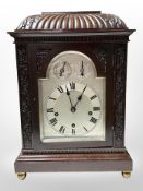A 20th-century mahogany eight day repeating bracket clock, with silvered dial,