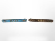 Two antique baby brooches, one in gold and one in silver.