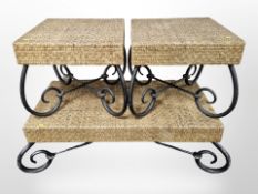 A contemporary wicker coffee table on metal legs,