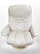 A cream stitched leather swivel chair
