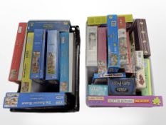 A quantity of jigsaws, puzzles and board games.
