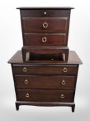 A Stag three drawer chest,