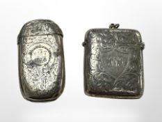 Two antique silver vesta cases.