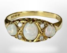 An antique 18ct gold opal and diamond ring, size L.