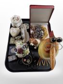 A group of quartz timepieces, lighters, commemorative crown, tin-plate metal figure of a bird,