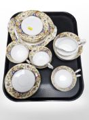 21 pieces of Aynsley floral-decorated tea china.