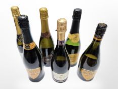 Six various bottles of Prosecco.