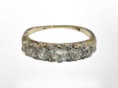 An antique gold five stone diamond ring, size O CONDITION REPORT: 3.8g. Marks worn.