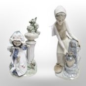 A Lladró figure of a girl standing by a column,