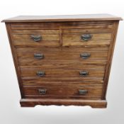 An Edwardian mahogany five drawer chest,