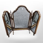 A walnut triple dressing table mirror,