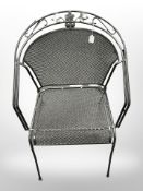 A cast metal garden chair