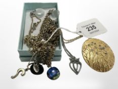 A box containing four pairs of silver-mounted earrings including pearl clip-on example,