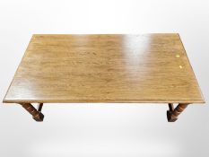 A reproduction oak coffee table,