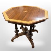 A reproduction walnut octagonal table,