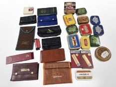 A quantity of tins bearing advertising including Players Navy Cut Cigarettes, Old Holborn Tobacco,