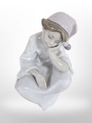 A Lladró figure of a girl in night dress, No. 6481.