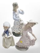 Three Nao figures of ladies, tallest 35cm.