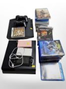 A Sony Playstation 3 and Playstation 4 console, various video games and Blu-Ray discs, Sony PSP,