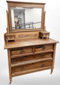 An Edwardian satin wood mirror back dressing chest,