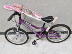 A girl's Apollo bike and a scooter
