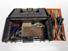 A tool box containing assorted hand tools and hard ware